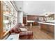 Open living area view featuring a kitchen with stainless appliances and a comfortable seating area at 2820 Se 14Th St, Ocala, FL 34471