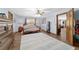 Large main bedroom with wood floors, lots of closet space, and natural light at 2820 Se 14Th St, Ocala, FL 34471