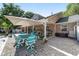 The brick patio around the pool has ample seating and a full outdoor kitchen with covered dining area at 2820 Se 14Th St, Ocala, FL 34471