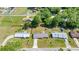 Aerial view showcases a serene residential neighborhood with mature trees and well-spaced homes at 2981 Ne 39Th Pl, Ocala, FL 34479