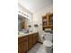 Bathroom featuring double sink vanity, and cabinet for linen storage at 2981 Ne 39Th Pl, Ocala, FL 34479