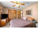 Cozy bedroom with closet, warm lighting, and comfortable furnishings creating a relaxing retreat at 2981 Ne 39Th Pl, Ocala, FL 34479
