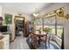 Cozy breakfast nook with bay window offering natural light and backyard views at 2981 Ne 39Th Pl, Ocala, FL 34479