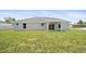 Spacious backyard view highlights the home's layout and outdoor living space at 3079 Sw 168 Pl, Ocala, FL 34473