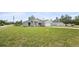 Well-maintained one-story home with lush front lawn and a long driveway at 3079 Sw 168 Pl, Ocala, FL 34473