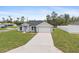 Well-maintained home with a lush front lawn and a spacious concrete driveway at 3079 Sw 168 Pl, Ocala, FL 34473
