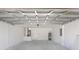 Spacious garage with new garage door opener and painted walls at 3079 Sw 168 Pl, Ocala, FL 34473