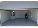 This well-lit garage features epoxy flooring, a utility sink, and an efficient water heater at 3079 Sw 168 Loop, Ocala, FL 34473