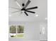 Well-lit living room showcases a stylish ceiling fan and new window at 3079 Sw 168 Pl, Ocala, FL 34473