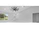 Bright living room features a modern ceiling fan, fresh paint, and new marble floors at 3079 Sw 168 Pl, Ocala, FL 34473