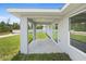 Covered patio perfect for outdoor relaxation, connecting to the backyard at 3079 Sw 168 Pl, Ocala, FL 34473