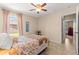 Relaxing bedroom offering natural light and a view of the backyard at 3102 Ne 26Th St, Ocala, FL 34470