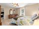 Comfortable bedroom with natural light, neutral paint, and decorative furniture at 3102 Ne 26Th St, Ocala, FL 34470
