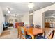 Spacious dining area that opens up to both the living room and kitchen areas at 3102 Ne 26Th St, Ocala, FL 34470