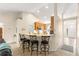 Stylish kitchen with a breakfast bar, wooden cabinets, and an open floor plan, perfect for entertaining at 3102 Ne 26Th St, Ocala, FL 34470