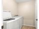 Functional laundry room with a washer and dryer, offering convenience and efficiency at 3102 Ne 26Th St, Ocala, FL 34470