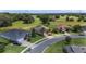 Aerial view of a neighborhood with well-maintained lawns and beautiful landscaping at 4360 Sw 62Nd Loop, Ocala, FL 34474