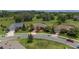 Aerial view of a neighborhood with well-maintained lawns and beautiful landscaping at 4360 Sw 62Nd Loop, Ocala, FL 34474