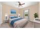 Bright bedroom features neutral colors, carpet, and natural light from the window at 4360 Sw 62Nd Loop, Ocala, FL 34474