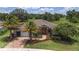 Attractive single-story home with stone accents and meticulously manicured lawn at 4360 Sw 62Nd Loop, Ocala, FL 34474
