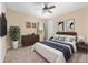 Bedroom with a queen-sized bed, dresser, and bedside tables creating a cozy, furnished space at 4360 Sw 62Nd Loop, Ocala, FL 34474