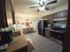 Spacious kitchen with stainless steel appliances, adjoining dining area, and ample countertop space at 5130 Se 106 Lane, Belleview, FL 34420