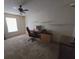 Home office with carpet, built-in shelves, and a comfortable workspace for productivity at 5130 Se 106 Lane, Belleview, FL 34420