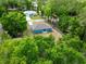 Aerial view of the property, highlighting the home's location and surrounding lush greenery at 5193 Nw 61St Ave, Ocala, FL 34482