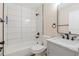 Bathroom featuring a tiled shower/tub combo and a marble vanity at 5193 Nw 61St Ave, Ocala, FL 34482