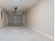Spacious garage with light-colored walls and concrete floor, ready for parking at 5193 Nw 61St Ave, Ocala, FL 34482