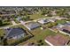 High-angle view of a neighborhood with spacious yards, a sense of community, and nearby green areas for outdoor activities at 5920 Sw 88Th Pl, Ocala, FL 34476