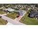 Aerial view of neighborhood with charming single-story home and large driveways at 5920 Sw 88Th Pl, Ocala, FL 34476