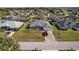 Extensive aerial view of neighborhood featuring charming single-story home and landscaped yards at 5920 Sw 88Th Pl, Ocala, FL 34476