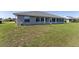 Spacious backyard with partially enclosed back porch at 5920 Sw 88Th Pl, Ocala, FL 34476