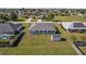 A detailed aerial view of a home with a well-maintained yard, a shed and ample space, perfect for relaxing outdoors at 5920 Sw 88Th Pl, Ocala, FL 34476