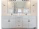 This bathroom features a large vanity with dual sinks and ample counter space at 5920 Sw 88Th Pl, Ocala, FL 34476