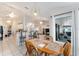 Dining area flows into the kitchen and living spaces, showcasing open concept living at 5920 Sw 88Th Pl, Ocala, FL 34476