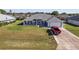 Charming single-story home with well-manicured lawn and attached two car garage at 5920 Sw 88Th Pl, Ocala, FL 34476