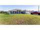 Charming single-story home with well-manicured lawn and attached two car garage at 5920 Sw 88Th Pl, Ocala, FL 34476