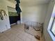 A bedroom used as flex space, featuring tile flooring and natural light from the windows at 6 Bahia Trace Loop, Ocala, FL 34472
