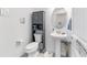Clean half-bath with stylish vanity and storage cabinet, designed for convenience at 6046 Sw 86Th Cir, Ocala, FL 34481