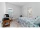 Inviting bedroom with dedicated workstation and bright natural light at 6046 Sw 86Th Cir, Ocala, FL 34481