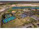 Aerial view of multiple athletic fields, courts, parking, community buildings and amenities at 6046 Sw 86Th Cir, Ocala, FL 34481