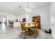 Open-concept dining area leads to a spacious kitchen with a large island at 6046 Sw 86Th Cir, Ocala, FL 34481