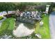 Community entrance with cascading waterfall, pond, and stone features at 6046 Sw 86Th Cir, Ocala, FL 34481