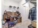 Organized storage room featuring shelves and storage containers at 6046 Sw 86Th Cir, Ocala, FL 34481