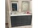 Bathroom vanity featuring double sinks and a modern marble countertop at 6051 Ne 25Th Ave, Ocala, FL 34479