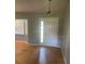 The entry way has fresh paint, a new front door, and a window on the left at 6051 Ne 25Th Ave, Ocala, FL 34479