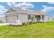 Charming single-story home with a well-manicured lawn and a two-car garage at 7337 Sw 89Th Ter, Ocala, FL 34481