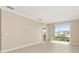Bright living room with large sliding glass doors, offering ample natural light at 7337 Sw 89Th Ter, Ocala, FL 34481